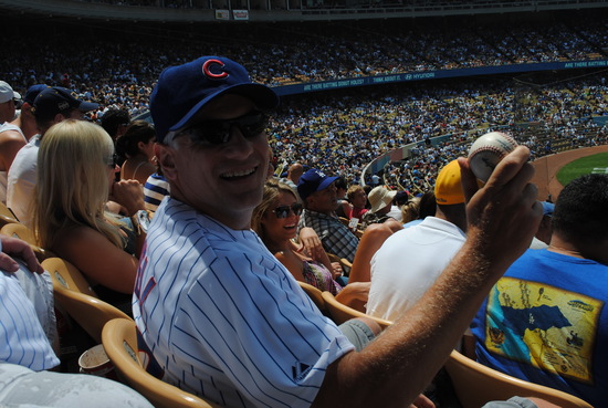 Fan in LA with Foul Ball Souvenir